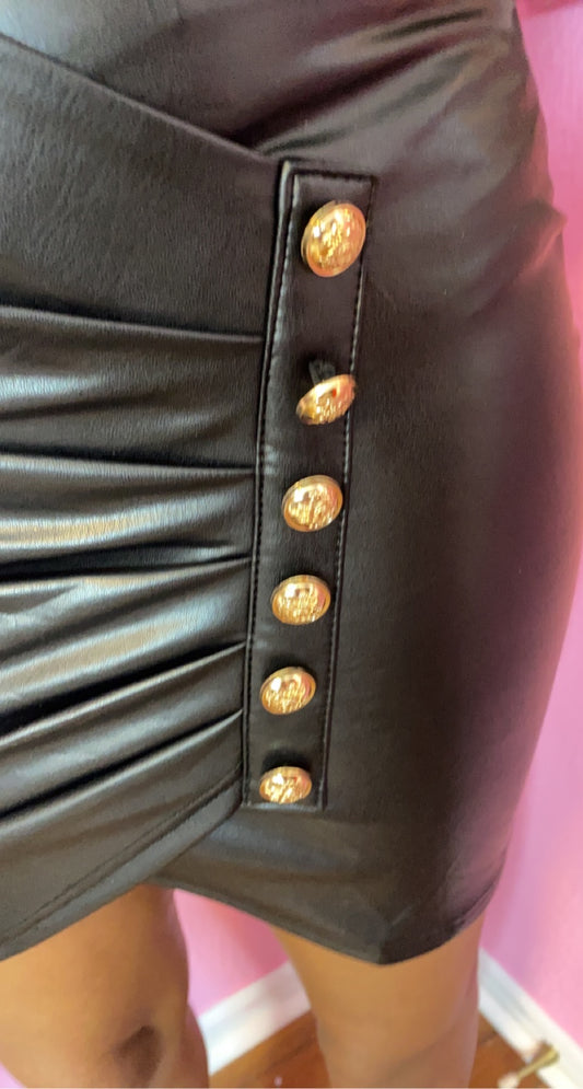 Faux leather mini skirt w/ gold button detail